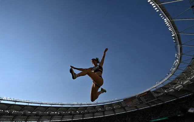 Alina Rotaru-Kottmann of Romania in action during her bronze medal performance in the Womens Long Jump Final during the World Athletics Championships, at the National Athletics Centre on August 20th, 2023 in Budapest, Hungary. (Photo by Dylan Martinez/Reuters)
