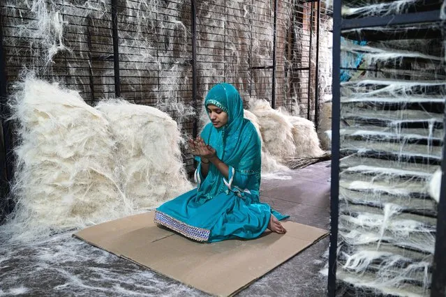 A labour offer prayer on the last Friday of Ramzan month at a vermicelli factory in Prayagraj on Friday, May 07, 2021. (Photo by Prabhat Kumar Verma/ZUMA Wire/Rex Features/Shutterstock)