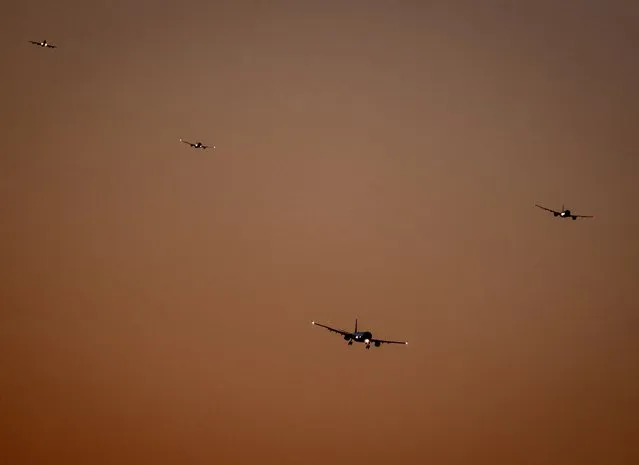 The first aircraft approach the international airport in Frankfurt, Germany, right after the landing ban ended on Monday, May 24, 2021. (Photo by Michael Probst/AP Photo)