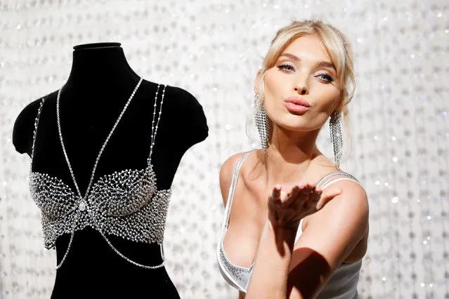 Victoria's Secret Angel, Elsa Hosk, poses next to the 2018 Dream Angels Fantasy Bra during the Victoria's Secret fashion show in New York, U.S., November 5, 2018. (Photo by Eduardo Munoz/Reuters)