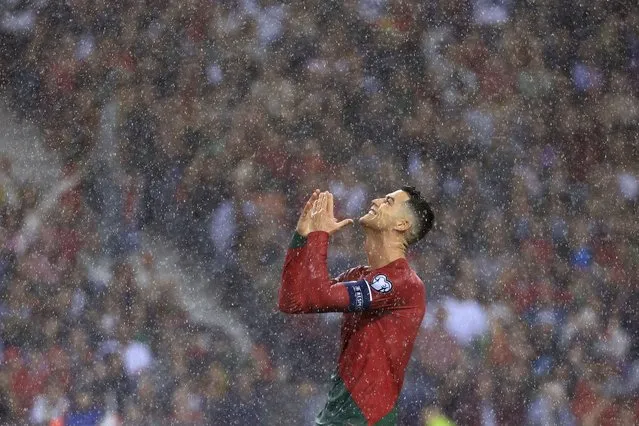 Portugal's Cristiano Ronaldo reacts during the Euro 2024 group J qualifying soccer match between Portugal and Slovakia at the Dragao stadium in Porto, Portugal, Friday, October 13, 2023. (Photo by Luis Vieira/AP Photo)