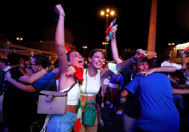 Italy fans celebrate after Federico Chiesa scores their first goal in Euro 2020 Semi-Final match between Italy and Spain, played at Wembley stadium, on July 6, 2021 in Rome, Italy. (Photo by Guglielmo Mangiapane/Reuters)