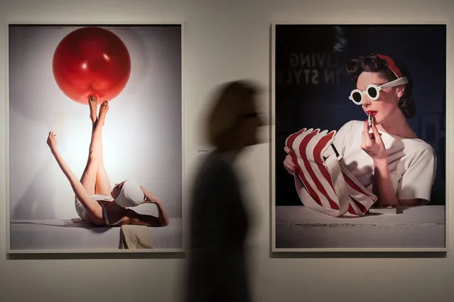 A picture made available on 11 February 2016 shows a visitor walking past works by photographer Horst P. Horst in Duesseldorf, Germany, 10 February 2016. The NRW Forum in Duesseldorf is featuring an exhibition of the notable fashion photographer from 12 February to 22 May 2016. (Photo by Federico Gambarini/EPA)