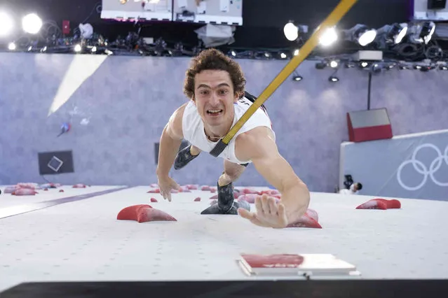 Adam Ondra, of the Czech Republic, participates during the speed qualification portion of the men's sport climbing competition at the 2020 Summer Olympics, Tuesday, August 3, 2021, in Tokyo, Japan. (Photo by Tsuyoshi Ueda/Pool Photo via AP Photo)