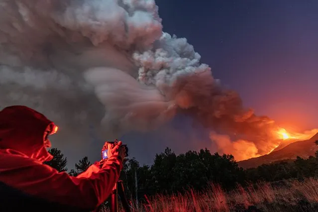 Smoke billows from the Mt Etna volcano as seen from Linguaglossa, Sicily, Monday, August 9, 2021. Europe's most active volcano remains active scattering ashes around a vastly populated area on its slopes. (Photo by Marco Restivo/Barcroft Media via Getty Images)