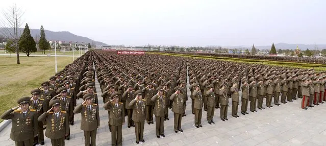 Korean People's Army personnel take part in a ceremony marking the birth anniversary of late leader Kim Il Sung at the Kumsusan Palace of the Sun in Pyongyang April 12, 2015 in this photo released by North Korea's Korean Central News Agency (KCNA) April 13, 2015. (Photo by Reuters/KCNA)