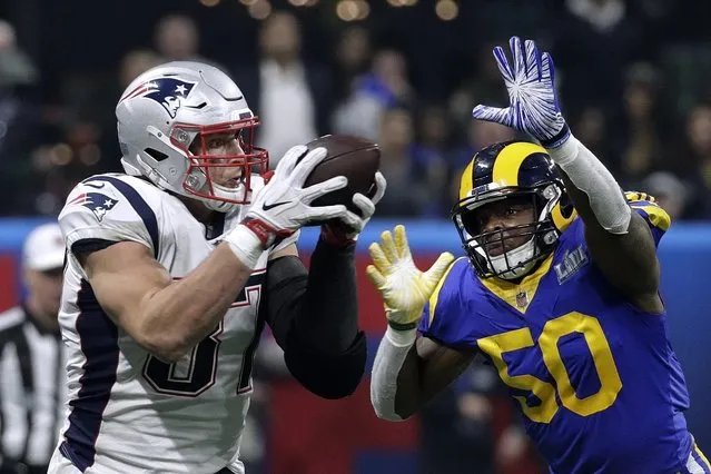 New England Patriots' Rob Gronkowski (87) catches a pass in front of Los Angeles Rams' Cory Littleton (58) during the second half of the NFL Super Bowl 53 football game Sunday, February 3, 2019, in Atlanta.(Photo by Patrick Semansky/AP Photo)
