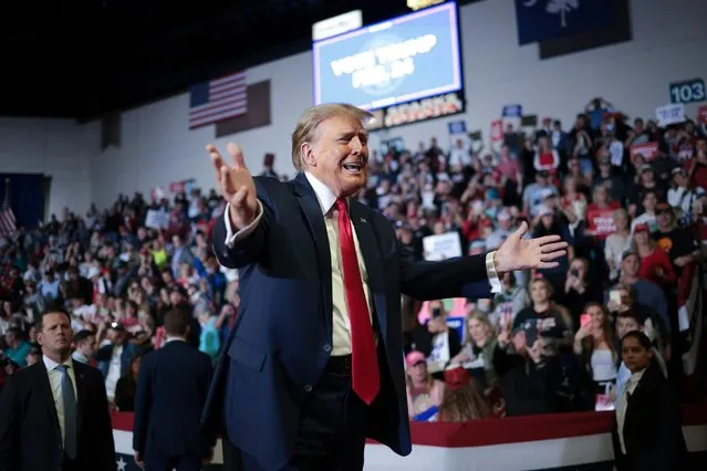 Republican presidential candidate and former President Donald Trump gestures to members of the audience as he leaves a Get Out The Vote rally at Coastal Carolina University on February 10, 2024 in Conway, South Carolina. South Carolina holds its Republican primary on February 24. (Photo by Win McNamee/Getty Images)