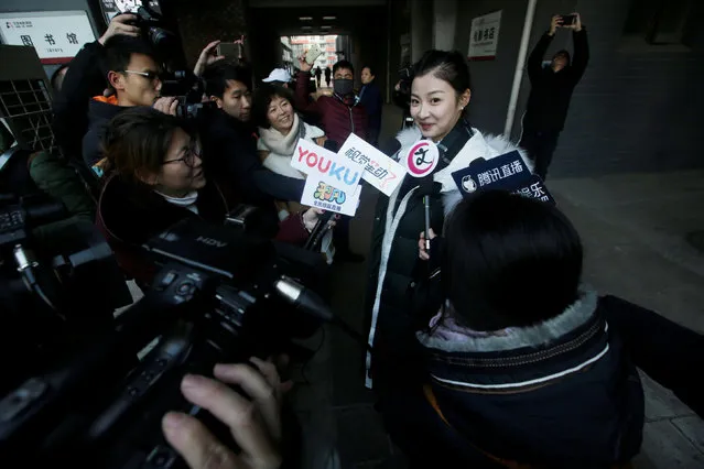 A student speaks to the media after her preliminary examination at Beijing Film Academy in Beijing, China February 8, 2017. (Photo by Jason Lee/Reuters)