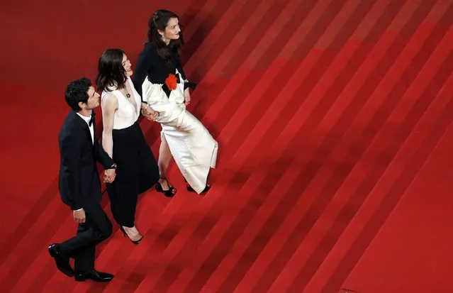Director Valerie Donzelli (C), cast members Jeremie Elkaim (L) and Anais Demoustier (R) pose on the red carpet as they arrive for the screening of the film “Marguerite et Julien” in competition at the 68th Cannes Film Festival in Cannes, southern France, May 19, 2015. (Photo by Regis Duvignau/Reuters)