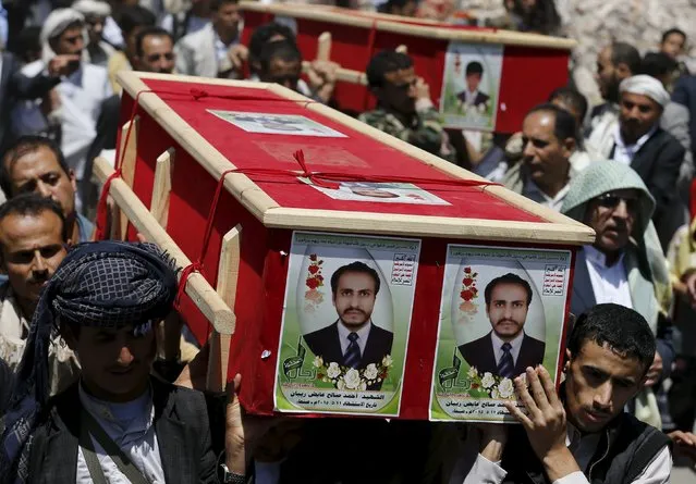 Houthi followers carry coffins of Houthi fighters during their funeral in Sanaa May 15, 2015. (Photo by Khaled Abdullah/Reuters)