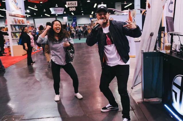 Tori Chargualas (L), 16, of Fairfield, California, dances with Christian rapper Joe Melendrez during the four-day 2017 Religious Education Congress in Anaheim, California, February 25, 2017. (Photo by Andrew Cullen/Reuters)