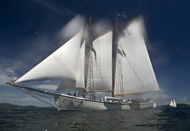 The American Eagle competes in the 39th Annual Great Schooner race, Friday, July 3, 2015, on Penobscot Bay off the coast of Rockland, Maine. The former fishing vessel was launched in 1930. The history of racing coasting schooners started over a century ago with sailors trying to beat their competitors to market, according to the Maine Windjammmer's Association. The first boat back to port always got the best price for their cargo, whether it be fish, granite or Christmas trees. (Photo by Robert F. Bukaty/AP Photo)