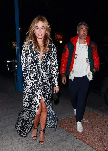 British singer-songwriter Rita Ora stepped out in this black and white leopard print dress and black heels with her boyfriend, film director Taika Waititi in Los Angeles on February 13, 2022. (Photo by Splash News and Pictures)