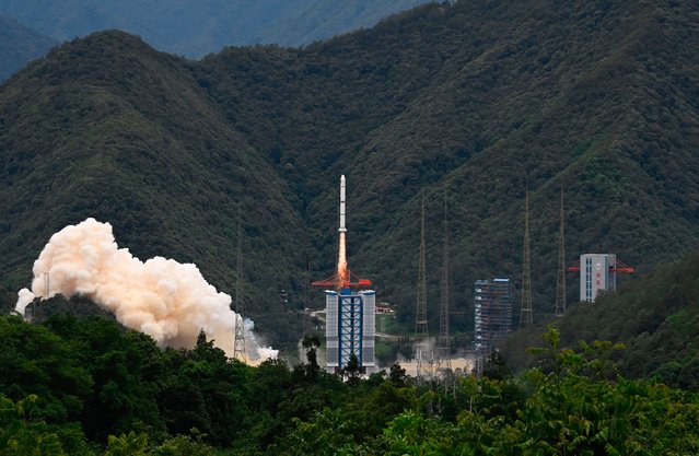 A Long March 2-C rocket carrying a satellite jointly developed by China and France dubbed the Space Variable Objects Monitor (SVOM), lifts off from a space base in Xichang, in China's southwestern Sichuan province on June 22, 2024. (Photo by Adek Berry/AFP Photo)