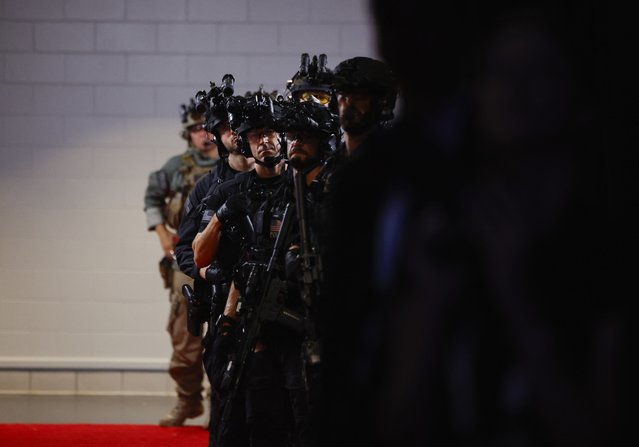 Security personnel stand in the hallway at the end of Day 2 of the RNC in Milwaukee on July 16, 2024. (Photo by Evelyn Hockstein/Reuters)