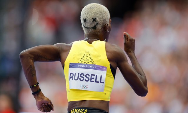 Jamaica's Janieve Russell competes in the women's 400m hurdles semi-final of the athletics event at the Paris 2024 Olympic Games at Stade de France in Saint-Denis, north of Paris, on August 6, 2024. (Photo by Tom Jenkins/The Guardian)