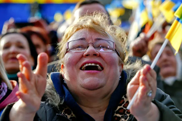 A supporter of Yulia Tymoshenko, leader of opposition Batkivshchyna party and presidential candidate, reacts at her last campaign rally in central Kiev, Ukraine, March 29, 2019. (Photo by Vasily Fedosenko/Reuters)