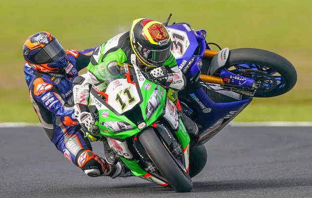 Garrett Gerloff (L) of the USA GRT Yamaha WorldSBK Junior Team and Sandro Cortese (R) of Germany on OUTDO Kawasaki TPR colide during a warm up session of the the World Superbike Championship on Phillip Island, Victoria, Australia, 01 March 2020. (Photo by Scott Barbour/EPA/EFE)