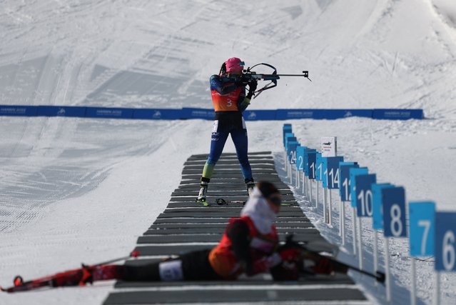 Darya Klimina of Kazakhstan takes aim in the women’s 7.5km sprint biathlon at the Asian Winter Games in Yabuli, China on February 11, 2025. (Photo by Hannah Mckay/Reuters)