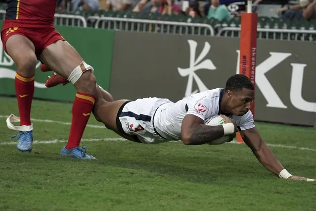 David Still of United States scores a try against Spain during the first day of the Hong Kong Sevens rugby tournament in Hong Kong, Friday, November 4, 2022. The Hong Kong Sevens, a popular stop on the World Rugby Sevens Series circuit, is part of the government's drive to restore the city's image as a vibrant financial hub after it scrapped mandatory hotel quarantine for travelers. (Photo by Anthony Kwan/AP Photo)