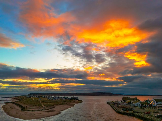 An aerial view of a spectacular sunset over Mudeford Sandbank and Christchurch Harbour, Dorset, UK on February 10, 2025, captured by photographer Steve Hogan. (Photo by SteveHogan/Bournemouth News)