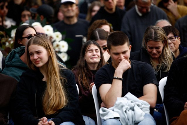 Friends and family mourn Israeli soldier Sergeant first class Adi Eldor who was killed in the southern Gaza Strip, amid the ongoing ground operation of the Israeli army against Palestinian Islamist group Hamas, at his funeral in Haifa, Israel on February 12, 2024. (Photo by Shir Torem/Reuters)