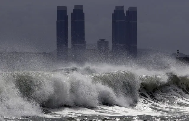High waves crash onto Haeundae Beach in Busan, South Korea, Wednesday, August 26, 2020, as Typhoon Bavi approaches the Korean Peninsula. Hundreds of flights were canceled in South Korea while North Korea's leader expressed concern about a potential loss of lives and crops as the countries braced for a fast-approaching typhoon forecast as one of the strongest to hit their peninsula this year. (Photo by Jo Jong-ho/Yonhap via AP Photo)