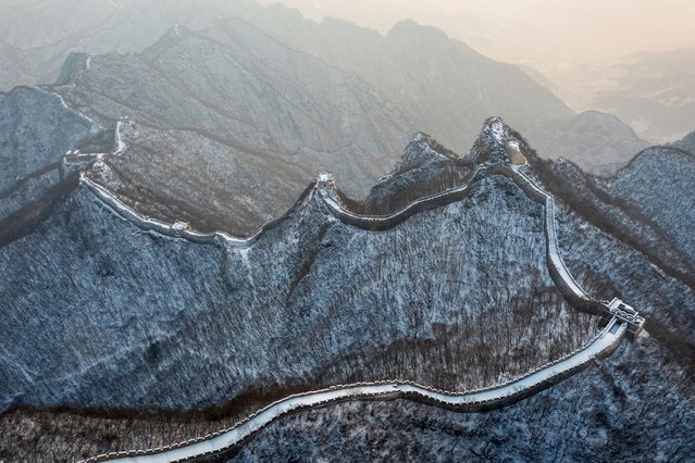 Aerial view of Jiankou Great Wall covered by snow on January 13, 2023 in Beijing, China. (Photo by VCG/VCG via Getty Images)