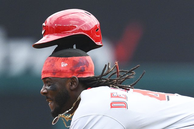 Cincinnati Reds' Elly De La Cruz starts his slide as he steals second base during the fourth inning of a baseball game against the Washington Nationals, Wednesday, July 23, 2025, in Washington. (Photo by Nick Wass/AP Photo)