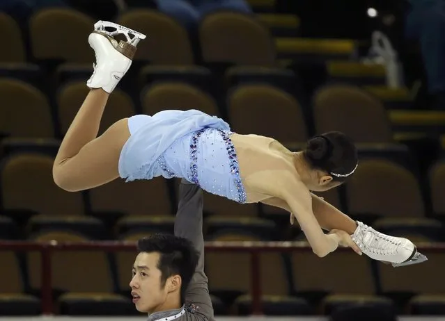 Xuehan Wang and Lei Wang of China perform during the Pairs short program at the Skate America figure skating competition in Milwaukee, Wisconsin October 23, 2015. (Photo by Lucy Nicholson/Reuters)