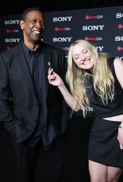 American actors Denzel Washington and Dakota Fanning at the CinemaCon Photo Call for Sony Pictures THE EQUALIZER 3 at The Colosseum at Caesar's Palace in Las Vegas, NV on April 24, 2023. (Photo by Eric Charbonneau/Rex Features/Shutterstock)