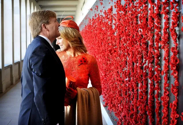King Willem-Alexander and Queen Maxima (R) of the Netherlands are pictured after placing poppies on the Wall of Remembrance during a visit to the Australian War Memorial in Canberra, Australia, November 2, 2016. (Photo by Mark Graham/Reuters)