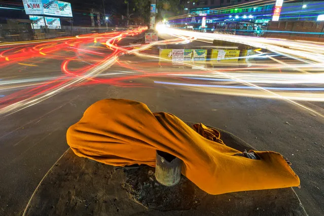 Floating Heroes, by Sowrav Das. First place, series. (Photo by Sowrav Das/LensCulture 2018 Street Photography Awards)