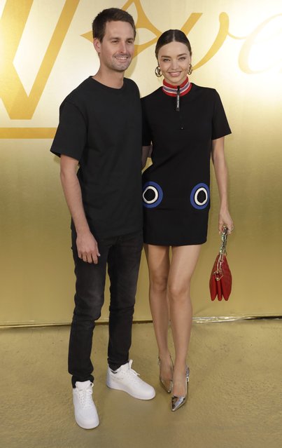 The youngest billionaire in the world in 2015,  American businessman Evan Spiegel and Australian model Miranda Kerr attend the Louis Vuitton Menswear Spring/Summer 2024 show as part of Paris Fashion Week on June 20, 2023 in Paris, France. (Photo by Antoine Flament/Getty Images)