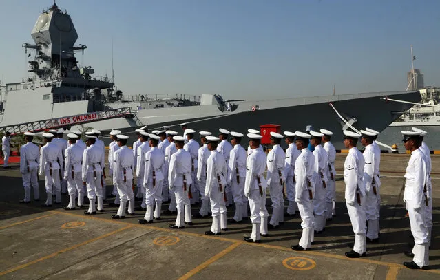 Indian naval sailors march during the commissioning ceremony of INS Chennai in Mumbai, India, Monday, November 21, 2016. INS Chennai is a Kolkata class stealth guided missile destroyer. (Photo by Rajanish Kakade/AP Photo)