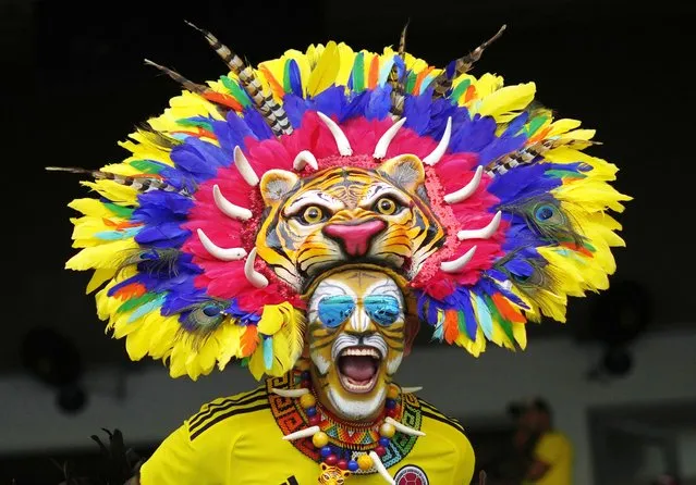 A fan of Colombia cheers prior to a qualifying soccer match against Venezuela for the FIFA World Cup 2026 at Metropolitano stadium in Barranquilla, Colombia, Thursday, September 7, 2023. (Photo by Fernando Vergara/AP Photo)