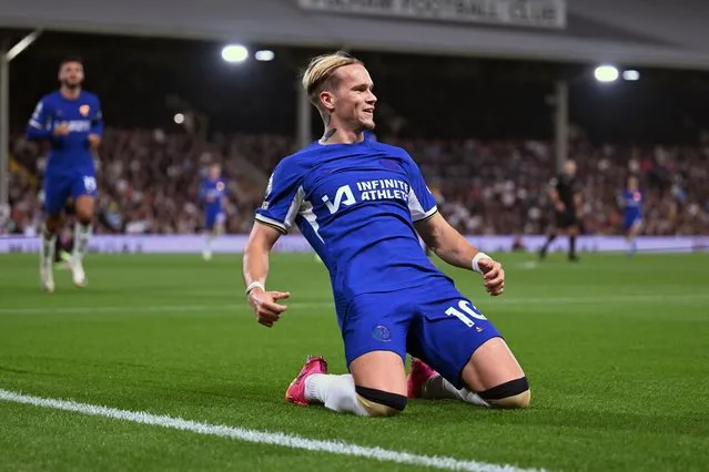 Mykhaylo Mudryk of Chelsea celebrates after scoring the team's first goal during the Premier League match between Fulham FC and Chelsea FC at Craven Cottage on October 02, 2023 in London, England. (Photo by Darren Walsh/Chelsea FC via Getty Images)