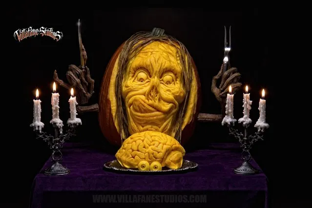 A horror face carved out of a pumpkin by Ray Villafane and team in Bellaire, Michigan. (Photo by Ray Villafane/Barcroft Media)