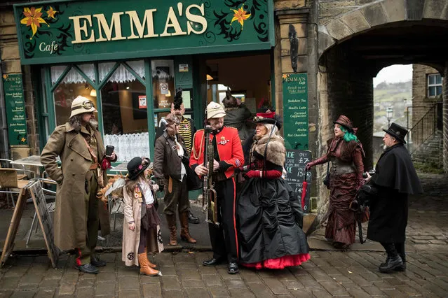 Steampunk enthusiasts attend the sixth annual Haworth Steampunk Weekend in Haworth, northern England on November 25, 2018. (Photo by Oli Scarff/AFP Photo)