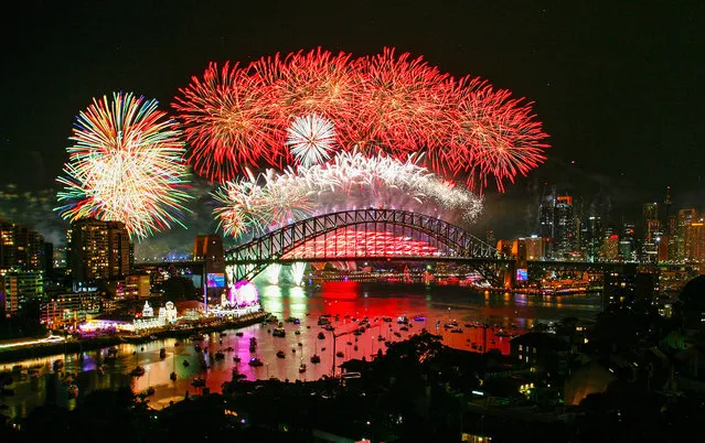 Fireworks explode over the Sydney Harbour Bridge during the midnight display on New Year's Eve on Sydney Harbour on January 1, 2019 in Sydney, Australia. (Photo by Scott Barbour\City of Sydney/Getty Images)