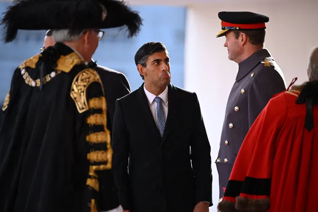 Britain's Prime Minister Rishi Sunak attends the Ceremonial Welcome for South Africa's President, on Horse Guards Parade in London on November 22, 2022, at the start of the President's two-day state visit. King Charles III is hosting his first state visit as monarch, welcoming South Africa's President to Buckingham Palace. (Photo by Leon Neal/Pool via AFP Photo)
