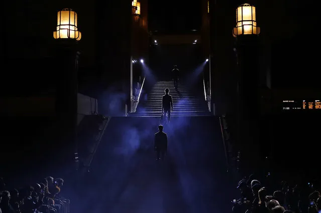 Models wear creations as part of the Ermenegildo Zegna men's Fall-Winter 2019-20 collection, unveiled during the Fashion Week in Milan, Italy, Friday, January 11, 2019. (Photo by Antonio Calanni/AP Photo)