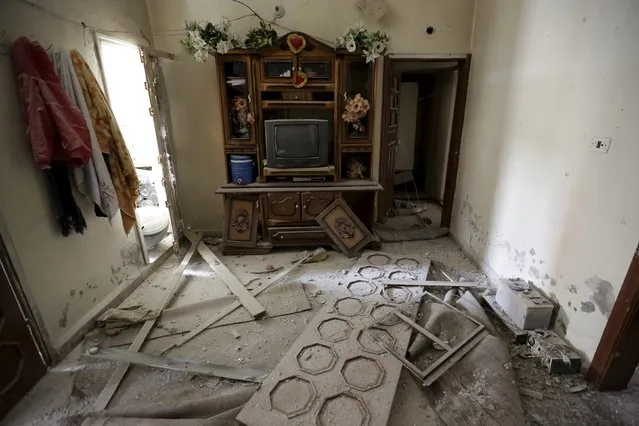 A view shows a damaged room at a site hit by shelling in the rebel-controlled area of Khan Sheikhoun, in Idlib province, Syria March 4, 201. (Photo by Khalil Ashawi/Reuters)