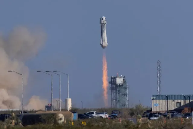 Blue Origin's rocket New Shepard blasts off carrying Star Trek actor William Shatner, 90, on billionaire Jeff Bezos's company's second suborbital tourism flight as part of a four-person crew near Van Horn, Texas, U.S., October 13, 2021. (Photo by Mike Blake/Reuters)