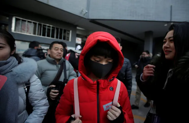 A student leaves after her preliminary examination at Beijing Film Academy in Beijing, China February 8, 2017. (Photo by Jason Lee/Reuters)