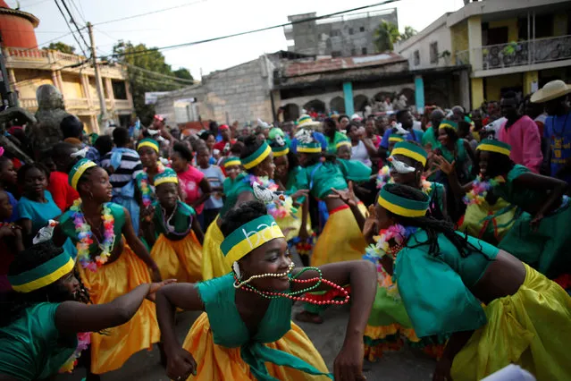 Revellers dance during the celebration of the Carnival in Jacmel, Haiti, February 19, 2017. (Photo by Andres Martinez Casares/Reuters)