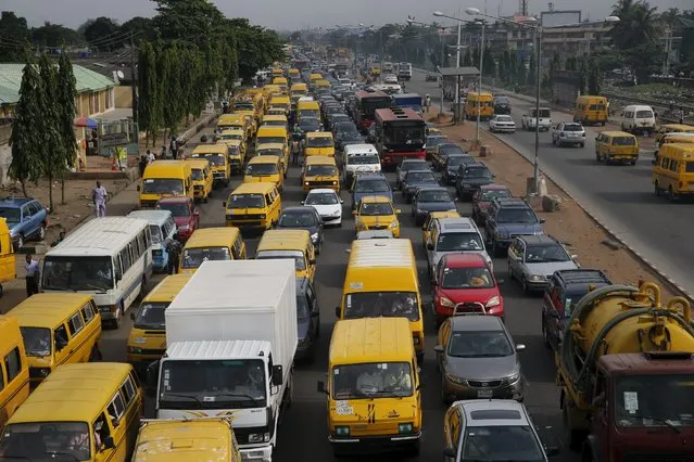 Heavy traffic passes through the Lagos-Abeokuta expressway in Ikeja district in Nigeria's commercial capital Lagos April 12, 2016. (Photo by Akintunde Akinleye/Reuters)