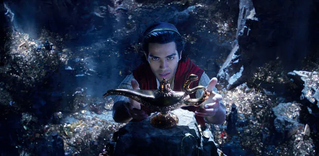 This image released by Disney shows Mena Massoud as Aladdin in Disney's live-action adaptation of the 1992 animated classic “Aladdin”. (Photo by Disney via AP Photo)