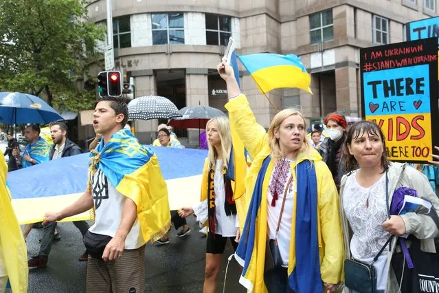 Protesters against the Russian invasion of Ukraine in Sydney, Australia on February 26, 2022. (Photo by Richard Milnes/Rex Features/Shutterstock)